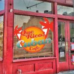 This is a storefront image of Que Rico! Cuban Café.