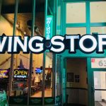 This image shows a storefront image of Wing Stop